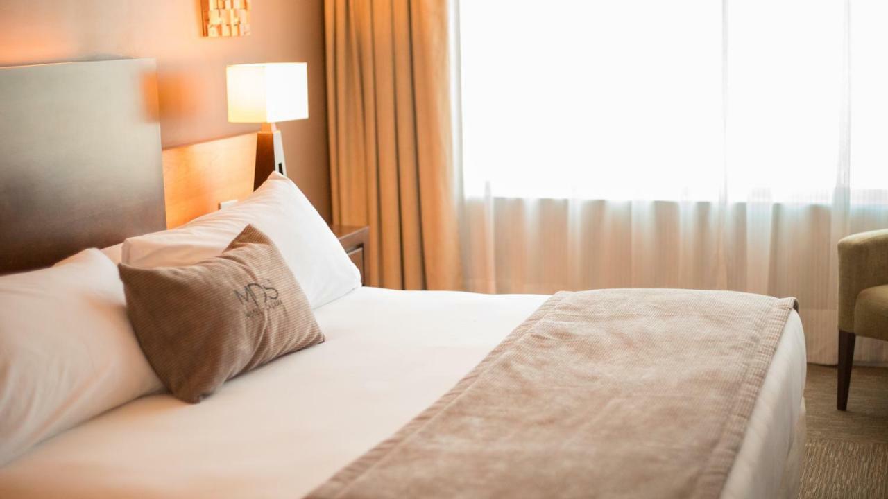 Mds Hotel Calama Exterior photo A bed runner