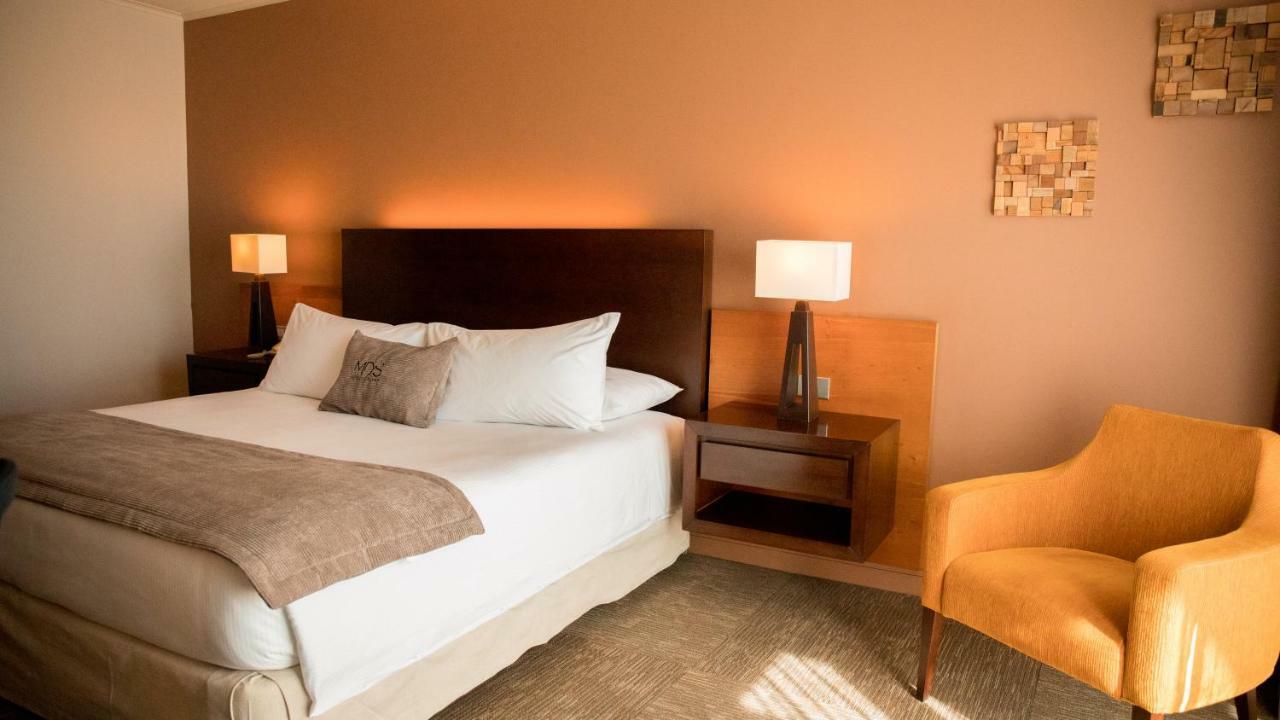 Mds Hotel Calama Exterior photo A bedroom at the hotel